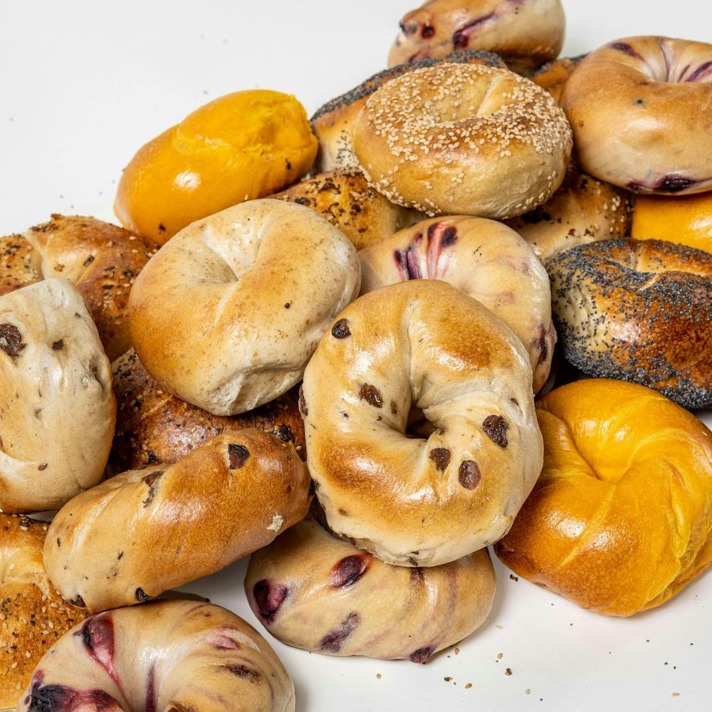 Utopia_Bagels_-_Baker_s_Dozen_bagel_pile_0006_square-1