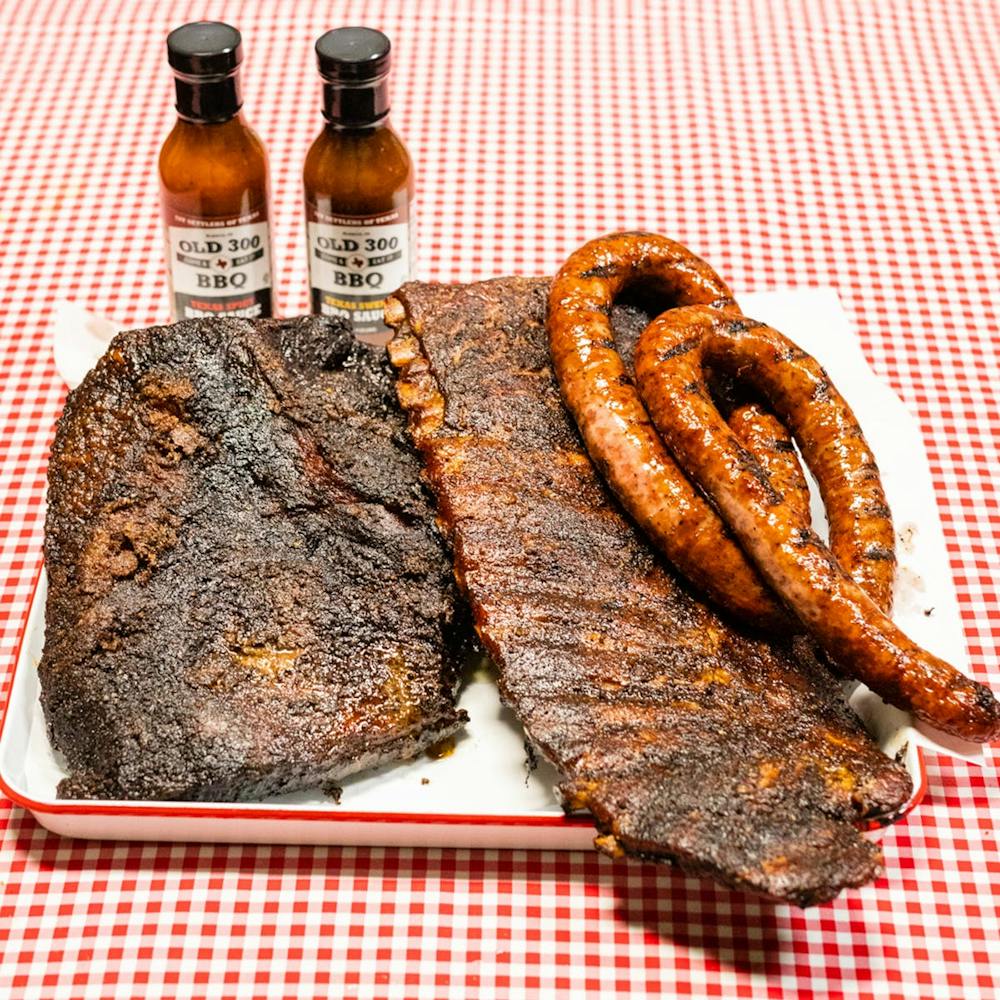 angus-brisket-ribs-and-sausages-trio.717feb7398f1ae621eaef92e32c47d42
