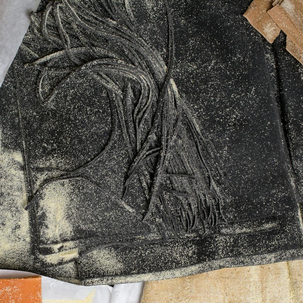 fresh-black-squid-ink-pasta-by-the-pound.146d9be01ad19025d317bf5efec9e770